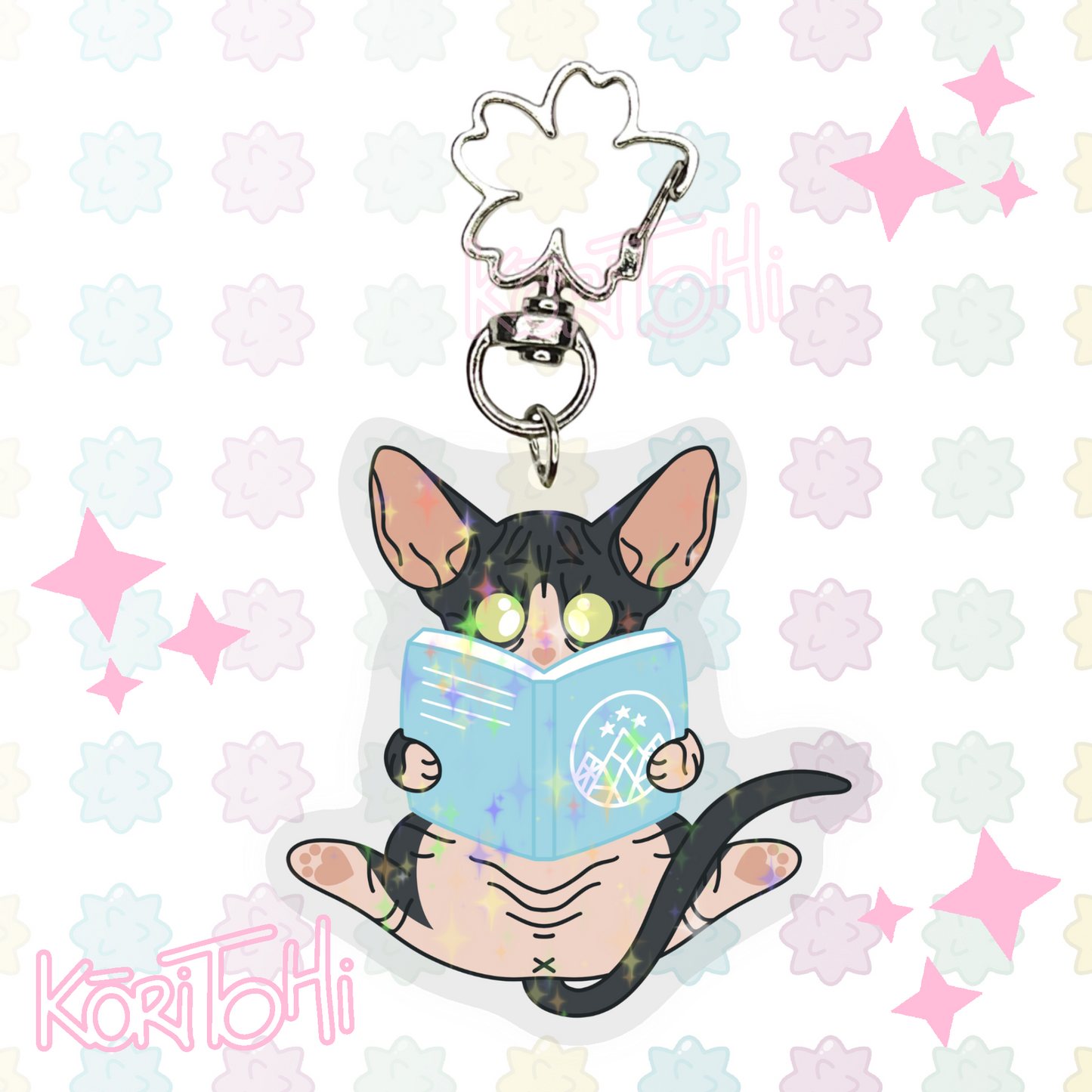 Llaveros gatos lectores
